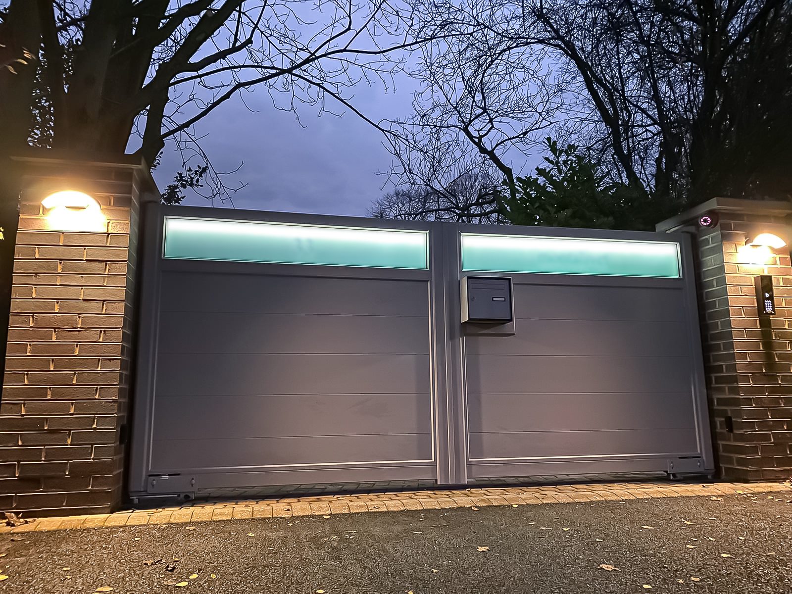 Led Lit glass anthracite grey driveway gates