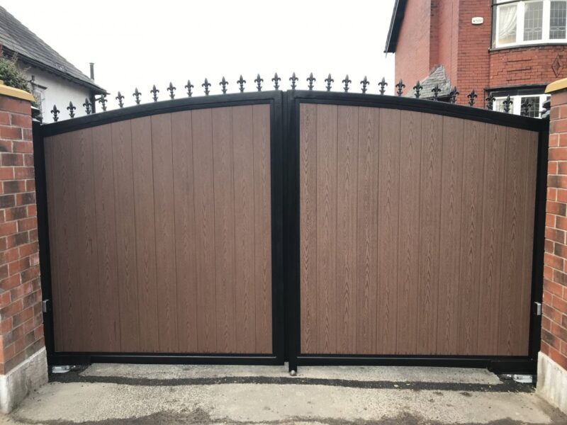 Composite driveway gates in a brown colour 