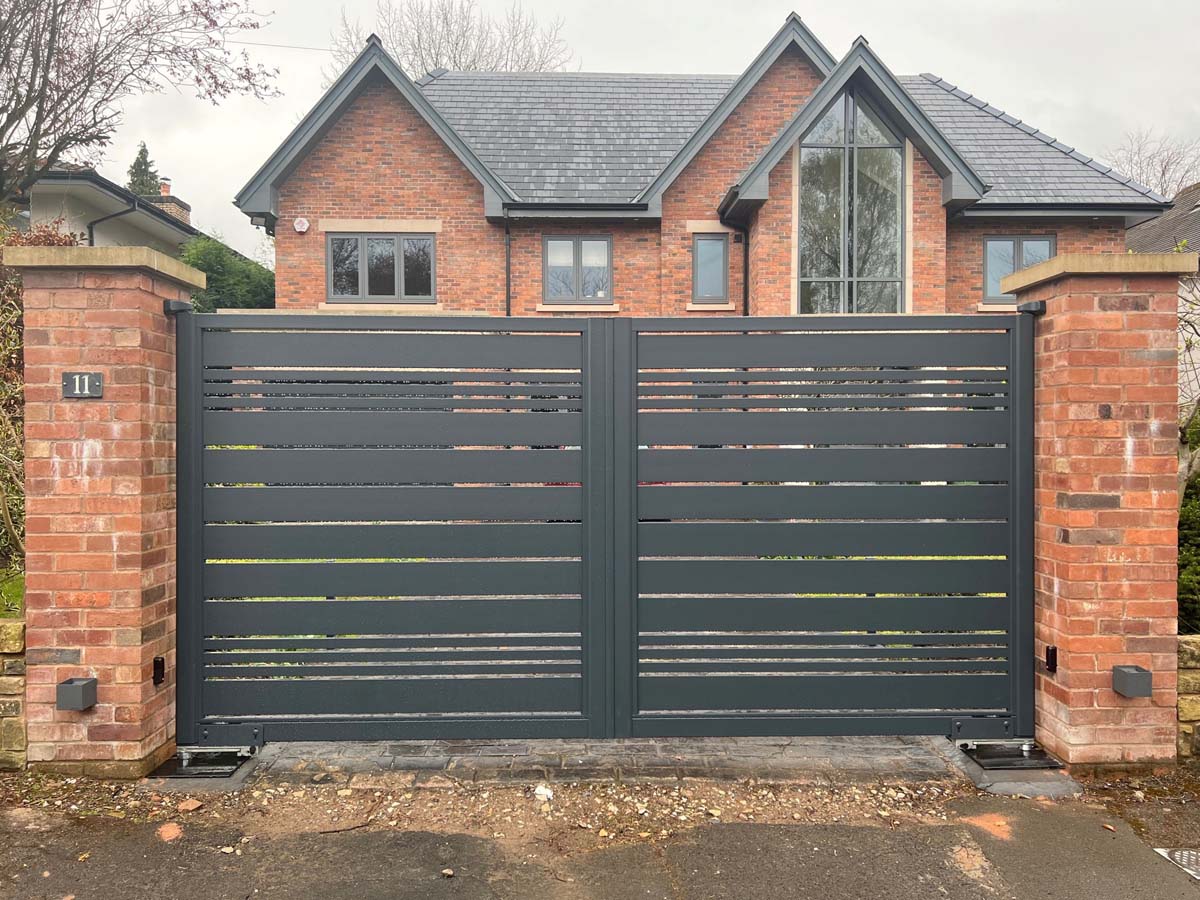 ultra modern aluminium driveway gates in stylish slatted design with varying widths horizontal boards