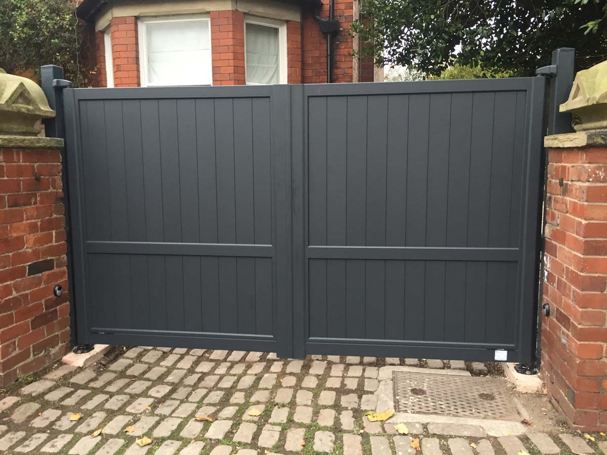 dark grey aluminium driveway gates in swing type