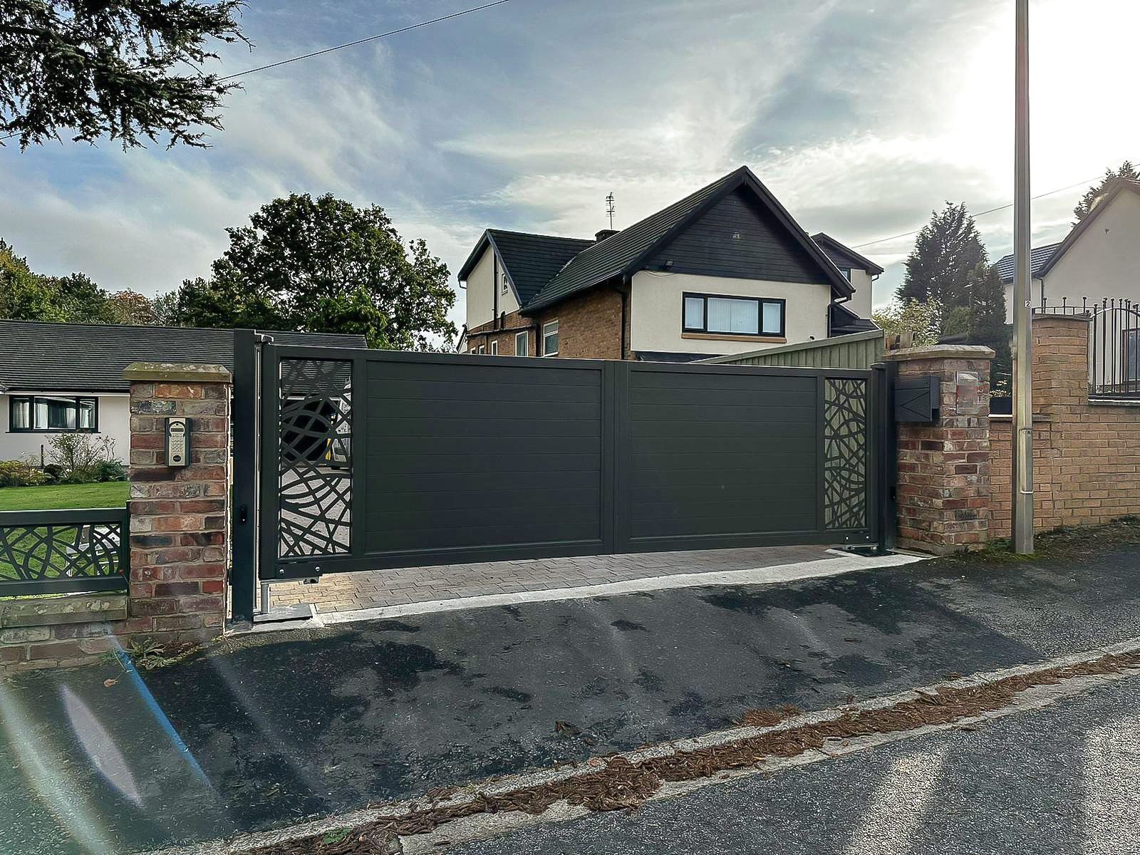 IZIS Lasercut Aluminium Swing Gates in Quartz Grey